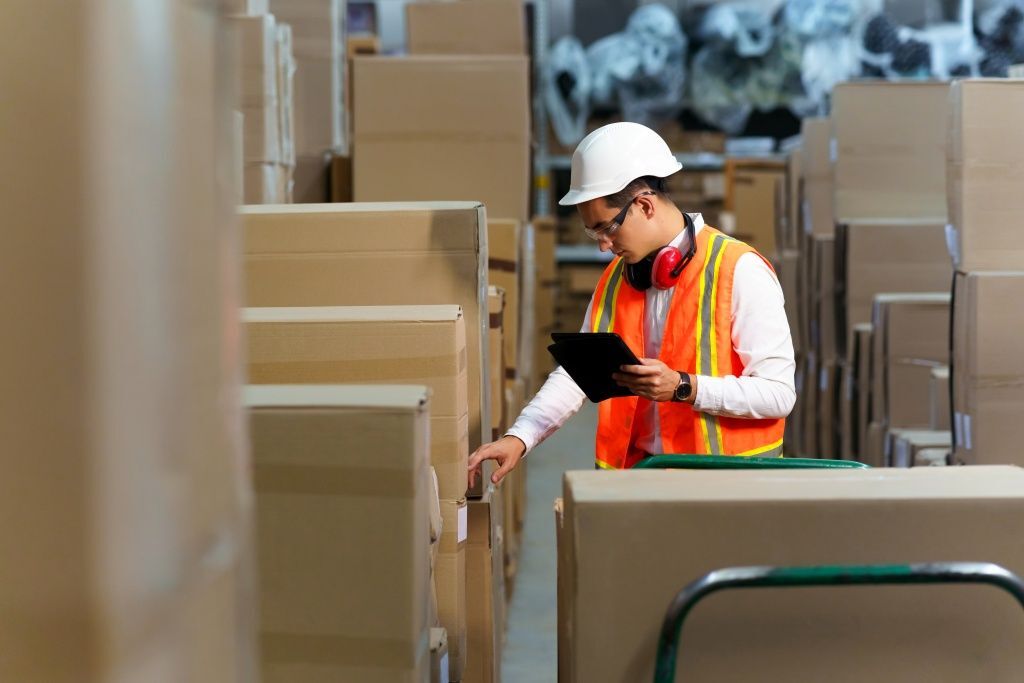 employee-of-a-logistics-warehouse-conducts-an-inventory-of-products.jpg
