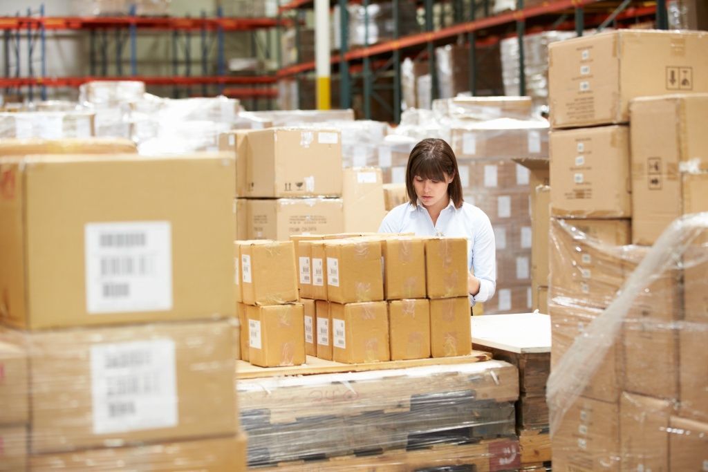 worker-in-warehouse-preparing-goods-for-dispatch-2021-08-26-16-12-47-utc.jpg