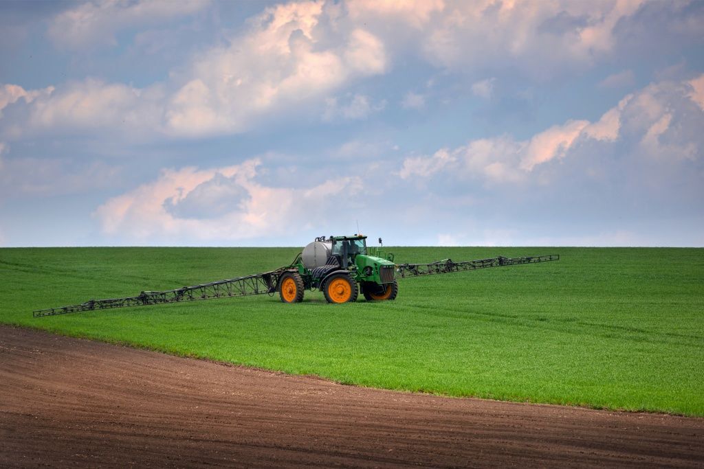 tractor-spraying-green-wheat-field-agricultural-w-2022-03-17-06-14-34-utc.jpg