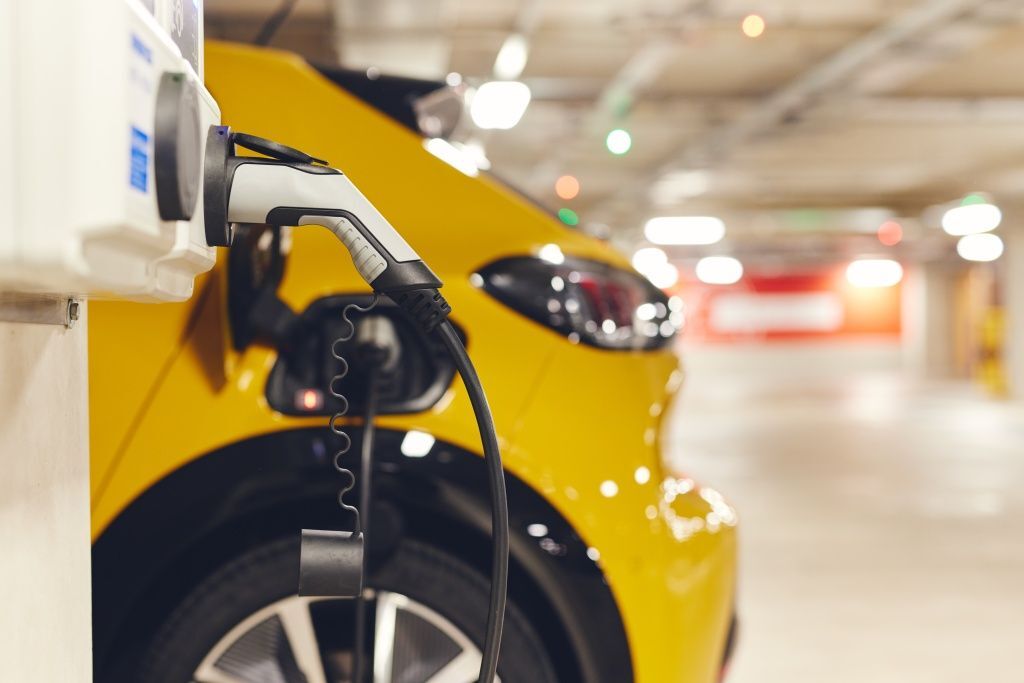 electric-car-charging-in-car-park-2022-05-01-23-53-52-utc.jpg